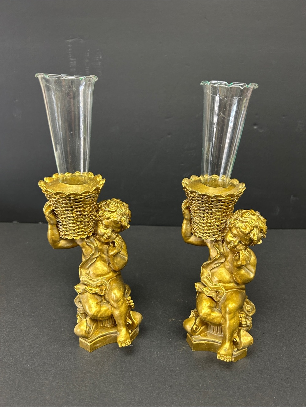 Vintage 80’s pair of gold tone resin cherubs holding basket candle/flower holder